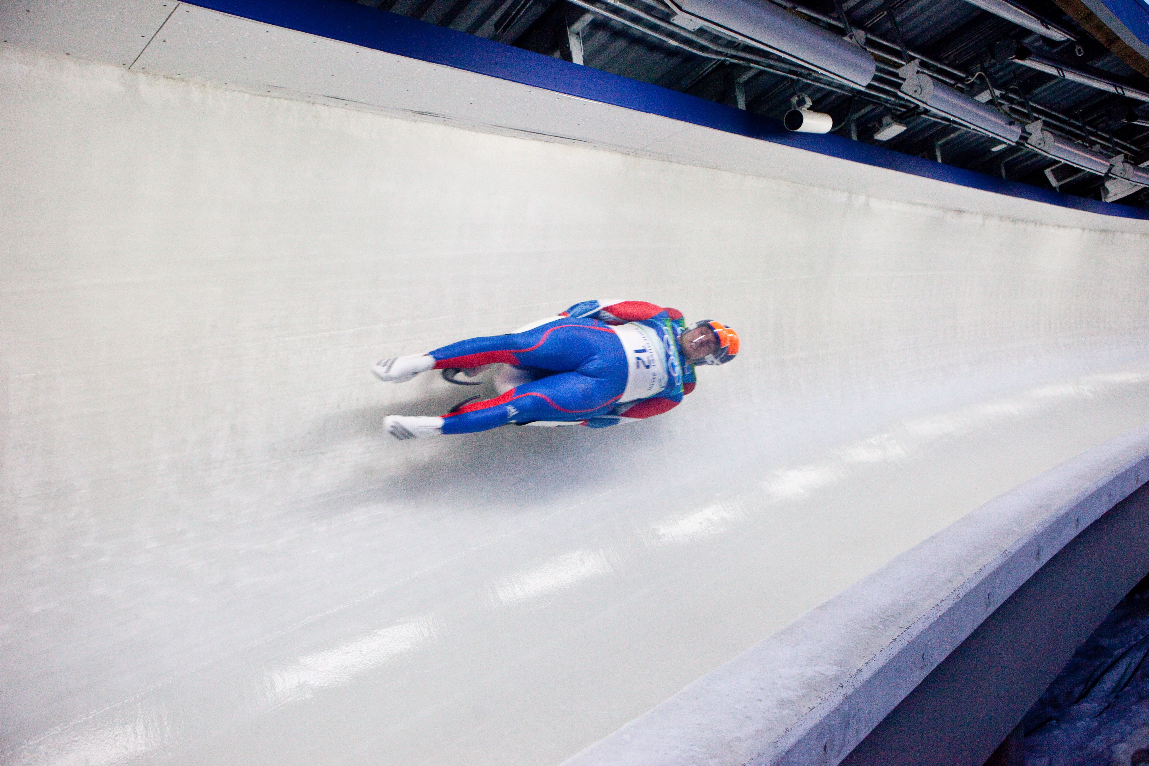 Photograph of person on a bobsled.
