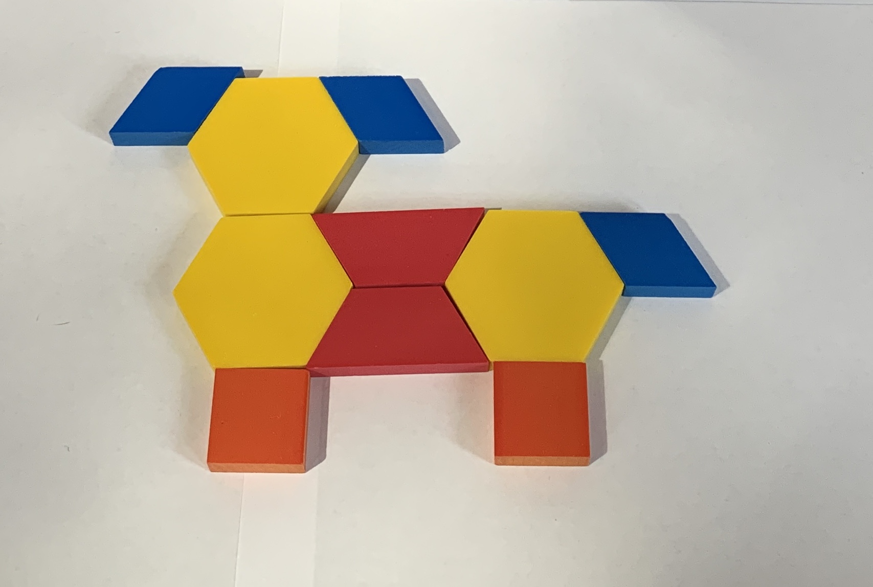 Pattern block design, dog. Yellow, 3. Red, 2. Blue, 3. Orange, 2.