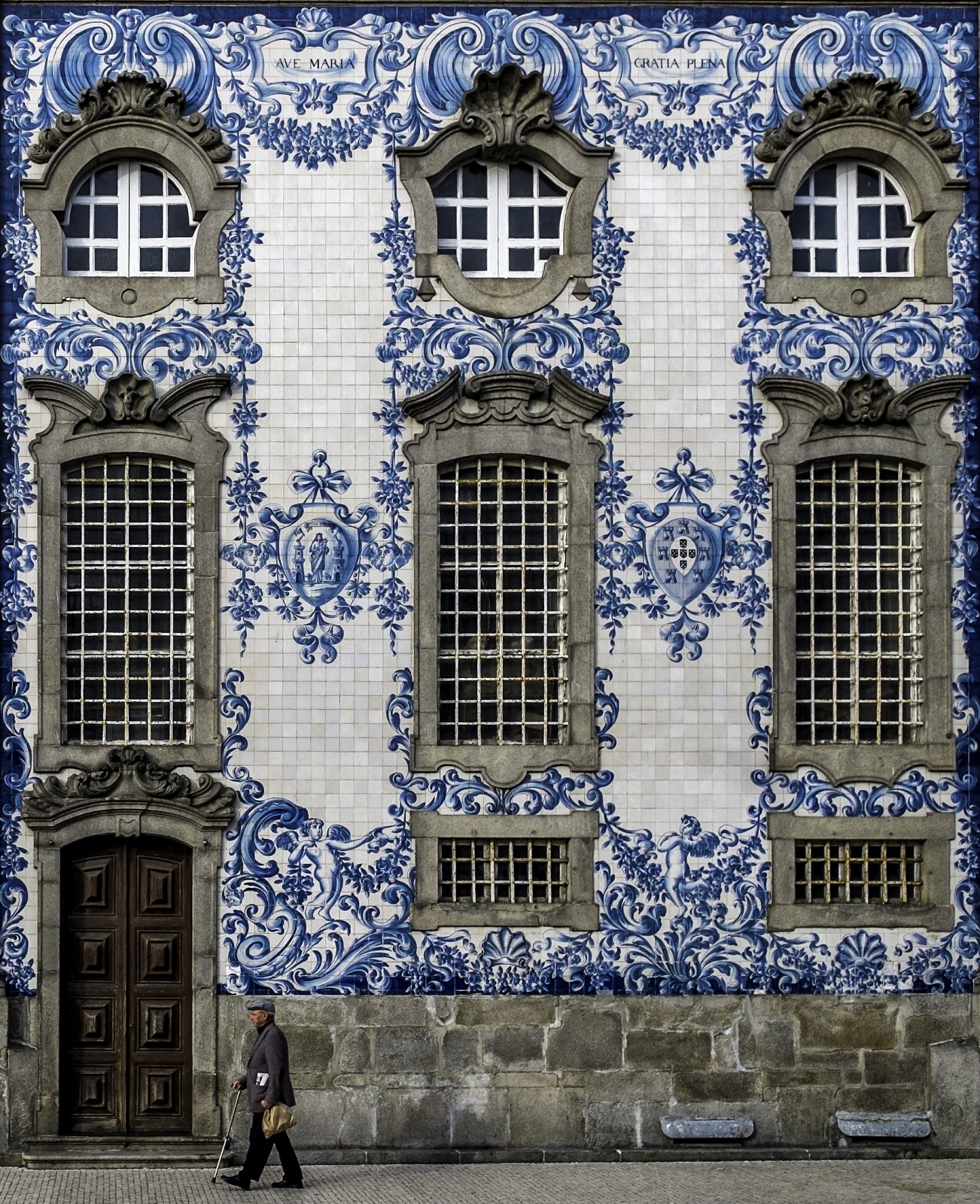 Painted tiles on a building in Portugal.