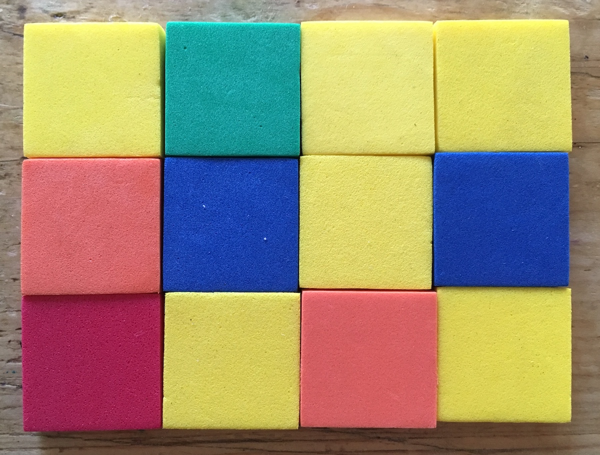 Rectangle made of inch tiles.