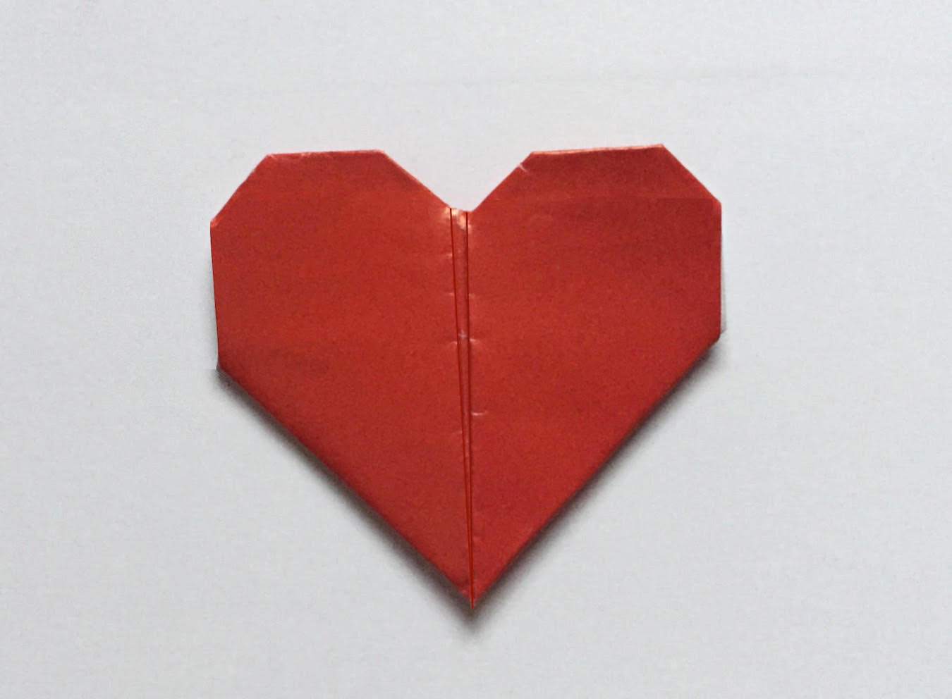 photo of a paper folded heart