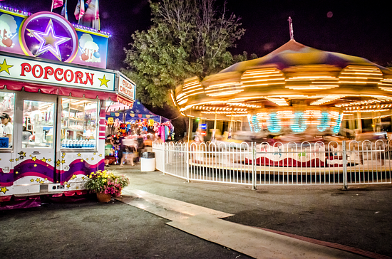an image of Concession stand + spinning merry go round