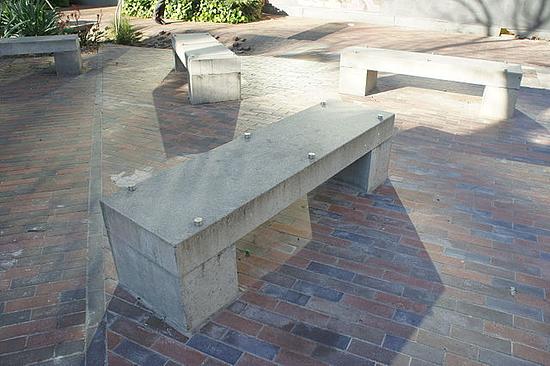 An image of a concrete bench is shown