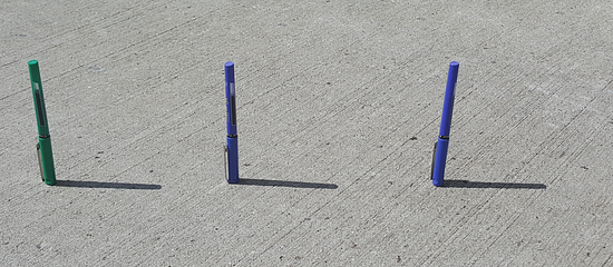 An image of 3 markers and their shadows